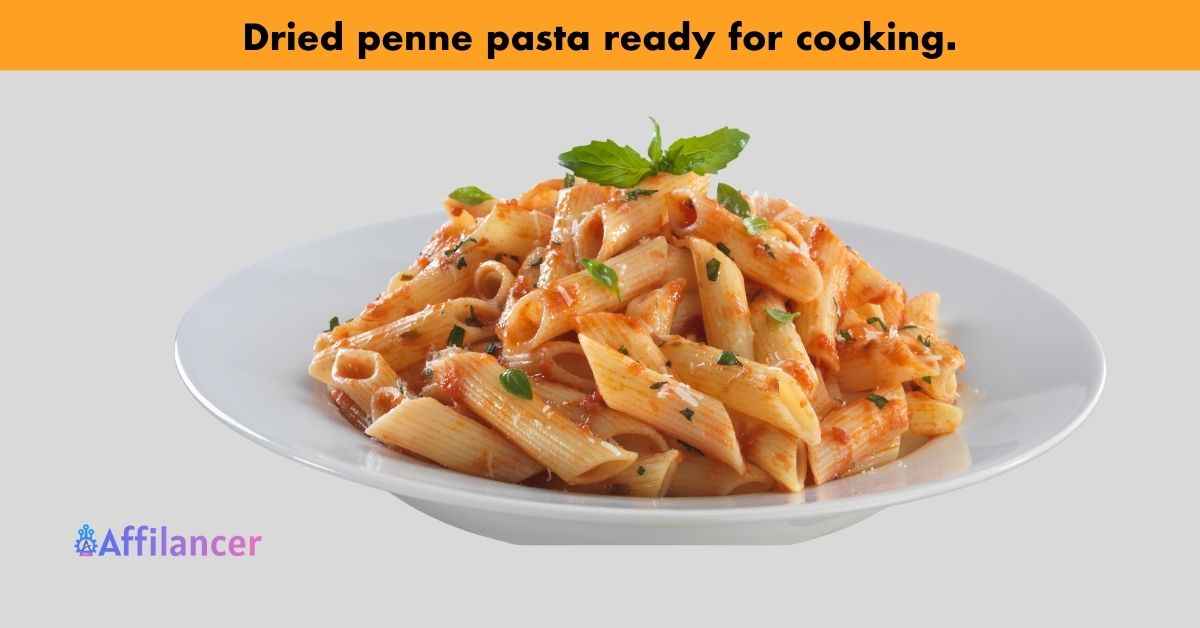 Dried penne pasta ready for cooking